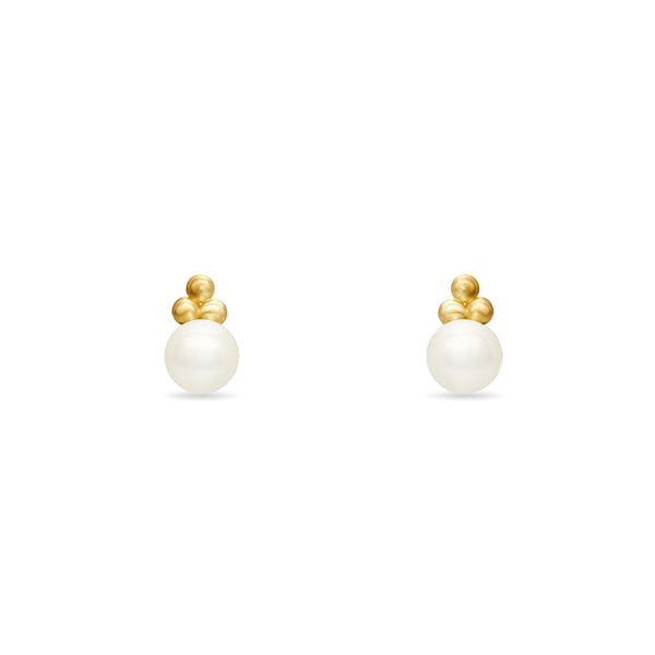 Are you the girl with a pearl earring? If so, this 14 karat gold earring is made for you.